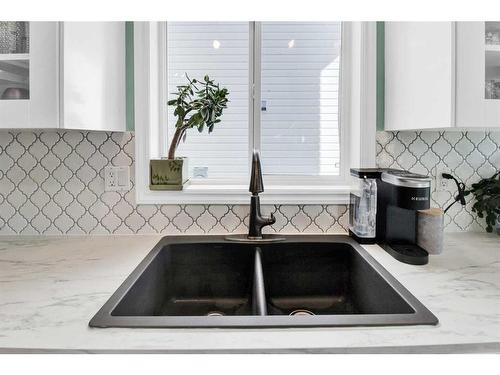 172 Somerside Close Sw, Calgary, AB - Indoor Photo Showing Kitchen With Double Sink