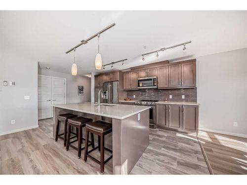 1310-10 Market Boulevard Se, Airdrie, AB - Indoor Photo Showing Kitchen With Stainless Steel Kitchen With Upgraded Kitchen