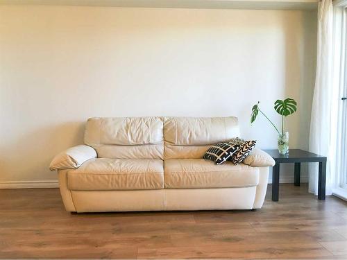 1348-2395 Eversyde Avenue Sw, Calgary, AB - Indoor Photo Showing Living Room