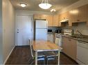 1348-2395 Eversyde Avenue Sw, Calgary, AB  - Indoor Photo Showing Kitchen 