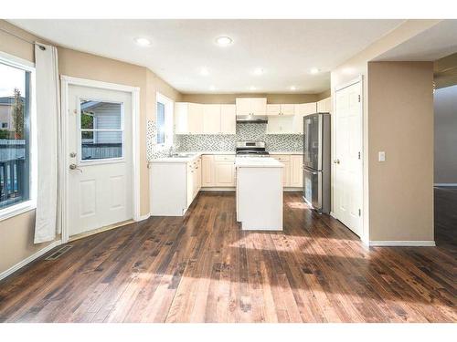 8 Arbour Ridge Place Nw, Calgary, AB - Indoor Photo Showing Kitchen With Upgraded Kitchen