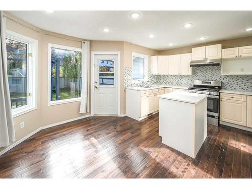 8 Arbour Ridge Place Nw, Calgary, AB - Indoor Photo Showing Kitchen With Upgraded Kitchen