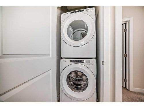 459 Canals Crossing Sw, Airdrie, AB - Indoor Photo Showing Laundry Room