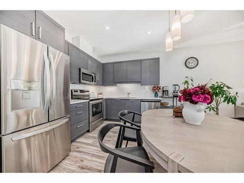 459 Canals Crossing Sw, Airdrie, AB - Indoor Photo Showing Kitchen With Stainless Steel Kitchen With Upgraded Kitchen