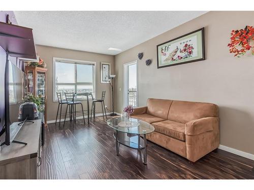 4306-73 Erin Woods Court Se, Calgary, AB - Indoor Photo Showing Living Room