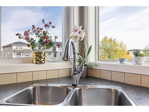 692 Luxstone Landing Sw, Airdrie, AB - Indoor Photo Showing Kitchen With Double Sink