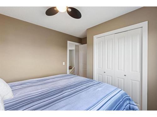 692 Luxstone Landing Sw, Airdrie, AB - Indoor Photo Showing Bedroom