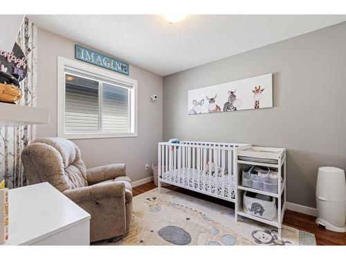 692 Luxstone Landing Sw, Airdrie, AB - Indoor Photo Showing Bedroom