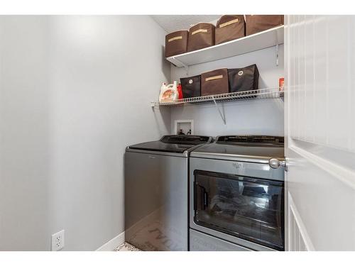 692 Luxstone Landing Sw, Airdrie, AB - Indoor Photo Showing Laundry Room