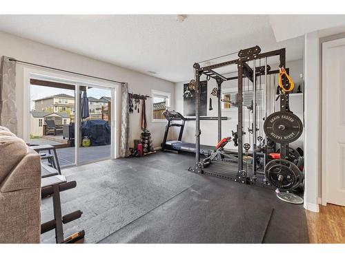 692 Luxstone Landing Sw, Airdrie, AB - Indoor Photo Showing Gym Room