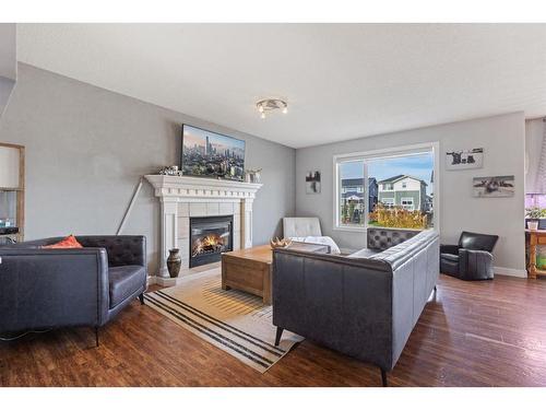 692 Luxstone Landing Sw, Airdrie, AB - Indoor Photo Showing Living Room With Fireplace