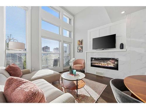 1602 12 Avenue Sw, Calgary, AB - Indoor Photo Showing Living Room With Fireplace