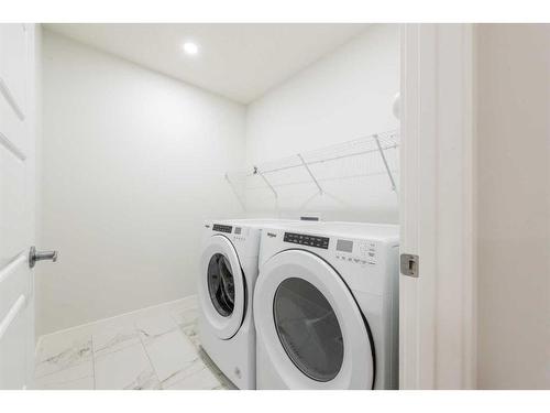 907 Corner Meadows Way Ne, Calgary, AB - Indoor Photo Showing Laundry Room