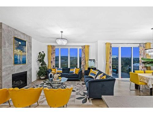 9 Sage Meadows Green Nw, Calgary, AB - Indoor Photo Showing Living Room With Fireplace