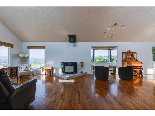 7063 Silverview Drive Nw, Calgary, AB - Indoor Photo Showing Living Room With Fireplace