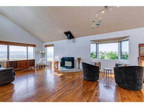 7063 Silverview Drive Nw, Calgary, AB - Indoor Photo Showing Living Room With Fireplace