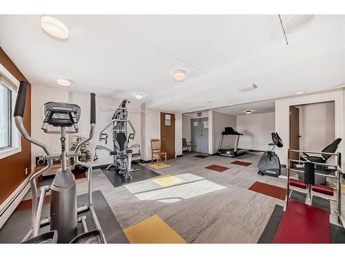 718-5204 Dalton Drive Nw, Calgary, AB - Indoor Photo Showing Gym Room