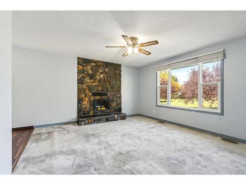 8704 6 Street Se, Calgary, AB - Indoor With Fireplace