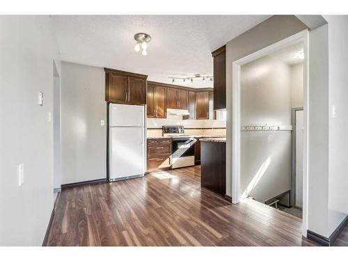 8704 6 Street Se, Calgary, AB - Indoor Photo Showing Kitchen