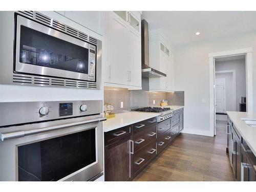 13 Damkar Drive, Rural Rocky View County, AB - Indoor Photo Showing Kitchen With Upgraded Kitchen