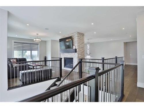 13 Damkar Drive, Rural Rocky View County, AB - Indoor Photo Showing Other Room With Fireplace