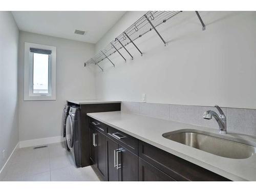 13 Damkar Drive, Rural Rocky View County, AB - Indoor Photo Showing Laundry Room