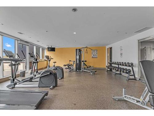 1004-550 Riverfront Avenue Se, Calgary, AB - Indoor Photo Showing Gym Room