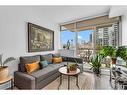 1004-550 Riverfront Avenue Se, Calgary, AB  - Indoor Photo Showing Living Room 