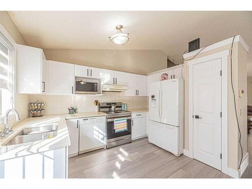 6248 Taralea Park Ne, Calgary, AB - Indoor Photo Showing Kitchen With Double Sink