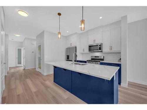 326 Ambleton Drive Nw, Calgary, AB - Indoor Photo Showing Kitchen With Stainless Steel Kitchen With Double Sink With Upgraded Kitchen