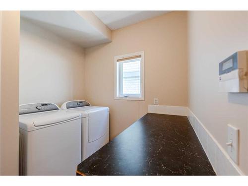 363 Rocky Ridge Drive Nw, Calgary, AB - Indoor Photo Showing Laundry Room