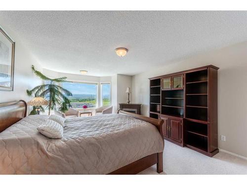 363 Rocky Ridge Drive Nw, Calgary, AB - Indoor Photo Showing Bedroom