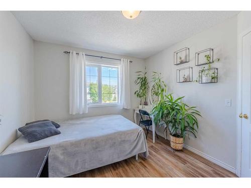 363 Rocky Ridge Drive Nw, Calgary, AB - Indoor Photo Showing Bedroom