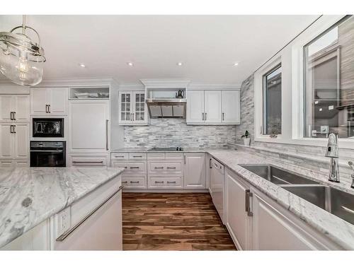 1069 East Chestermere Drive, Chestermere, AB - Indoor Photo Showing Kitchen With Double Sink With Upgraded Kitchen