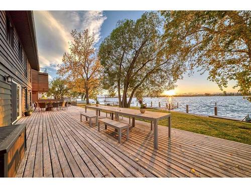 1069 East Chestermere Drive, Chestermere, AB - Outdoor With Body Of Water With Deck Patio Veranda