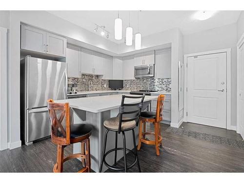 1215-3727 Sage Hill Drive Nw, Calgary, AB - Indoor Photo Showing Kitchen With Stainless Steel Kitchen With Upgraded Kitchen