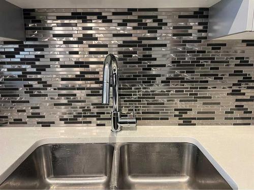 1215-3727 Sage Hill Drive Nw, Calgary, AB - Indoor Photo Showing Kitchen With Double Sink