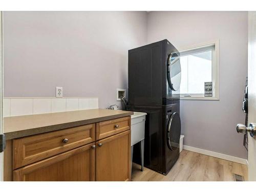 10 Tuscany Meadows Heights Nw, Calgary, AB - Indoor Photo Showing Laundry Room