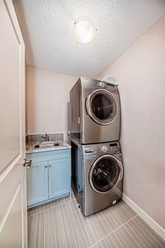 114 Sage Meadows Way Nw, Calgary, AB - Indoor Photo Showing Laundry Room