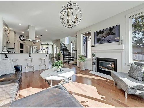 4502 20 Avenue Nw, Calgary, AB - Indoor Photo Showing Living Room With Fireplace