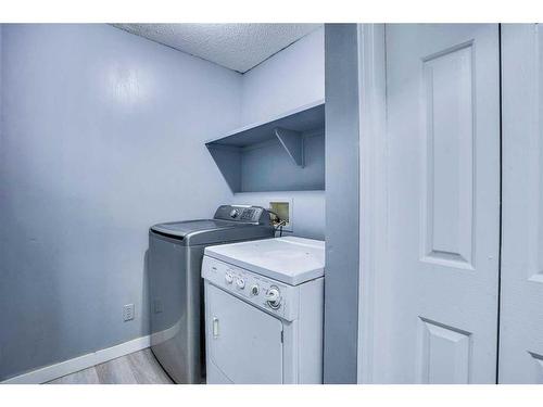 84 Douglas Glen Crescent Se, Calgary, AB - Indoor Photo Showing Laundry Room