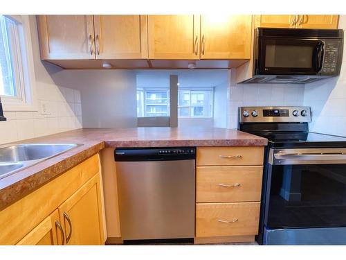 504-626 15 Avenue Sw, Calgary, AB - Indoor Photo Showing Kitchen With Stainless Steel Kitchen With Double Sink