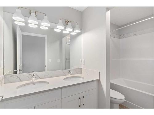 42 Hotchkiss Row Se, Calgary, AB - Indoor Photo Showing Bathroom