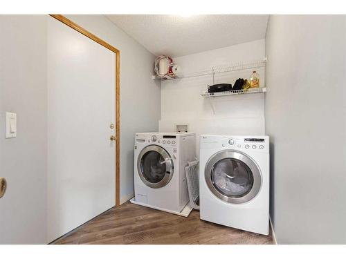 66 Tuscany Hills Point Nw, Calgary, AB - Indoor Photo Showing Laundry Room