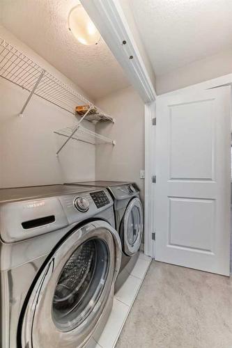 48 Nolanhurst Crescent Nw, Calgary, AB - Indoor Photo Showing Laundry Room