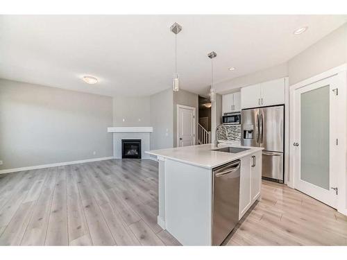 48 Nolanhurst Crescent Nw, Calgary, AB - Indoor Photo Showing Kitchen With Fireplace With Upgraded Kitchen