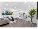 179 Flavelle Road Se, Calgary, AB  - Indoor Photo Showing Living Room 