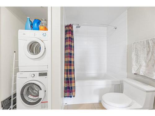 2303-1118 12 Avenue Sw, Calgary, AB - Indoor Photo Showing Laundry Room