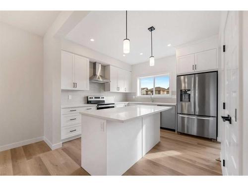 730 Bayview Hill Sw, Airdrie, AB - Indoor Photo Showing Kitchen With Stainless Steel Kitchen With Upgraded Kitchen