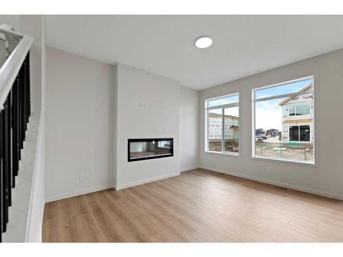 41 Corner Glen Road Ne, Calgary, AB - Indoor Photo Showing Living Room With Fireplace